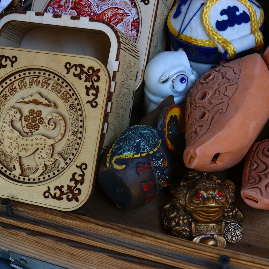 a wooden box filled with lots of different types of items